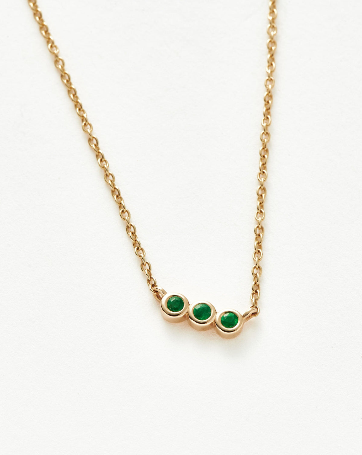 Solid Gold Emerald Solitaire Trio Necklace