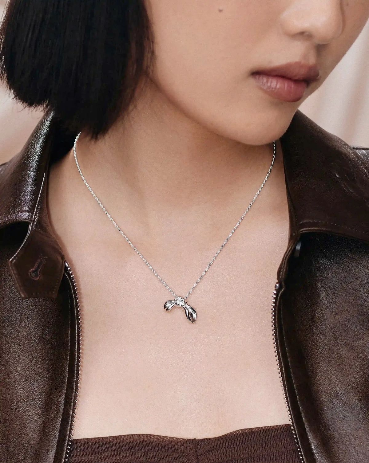 MARKGONG Bow Pendant Necklace | Silver Plated
